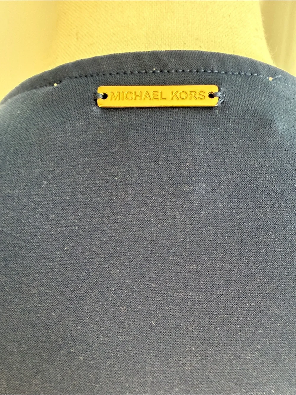 Michael Kors Navy Long-Sleeve Top with Gold Eyelet Detail